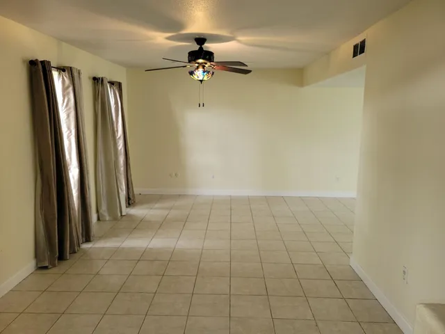 a view of hallway with a window