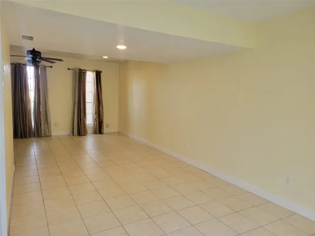 a view of a room with a walk in closet and window