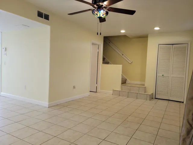 a kitchen with a cabinets and window