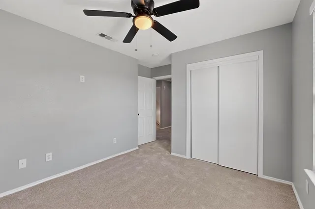 a bathroom with a sink a mirror and shower