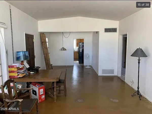 a view of a dining room with furniture