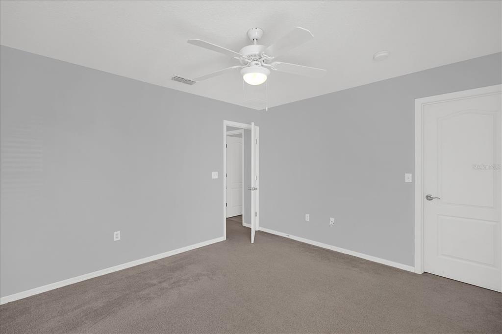1453 Royal Ridge Drive Davenport, FL 33896 - Photo 13 of 32 a view of an empty room