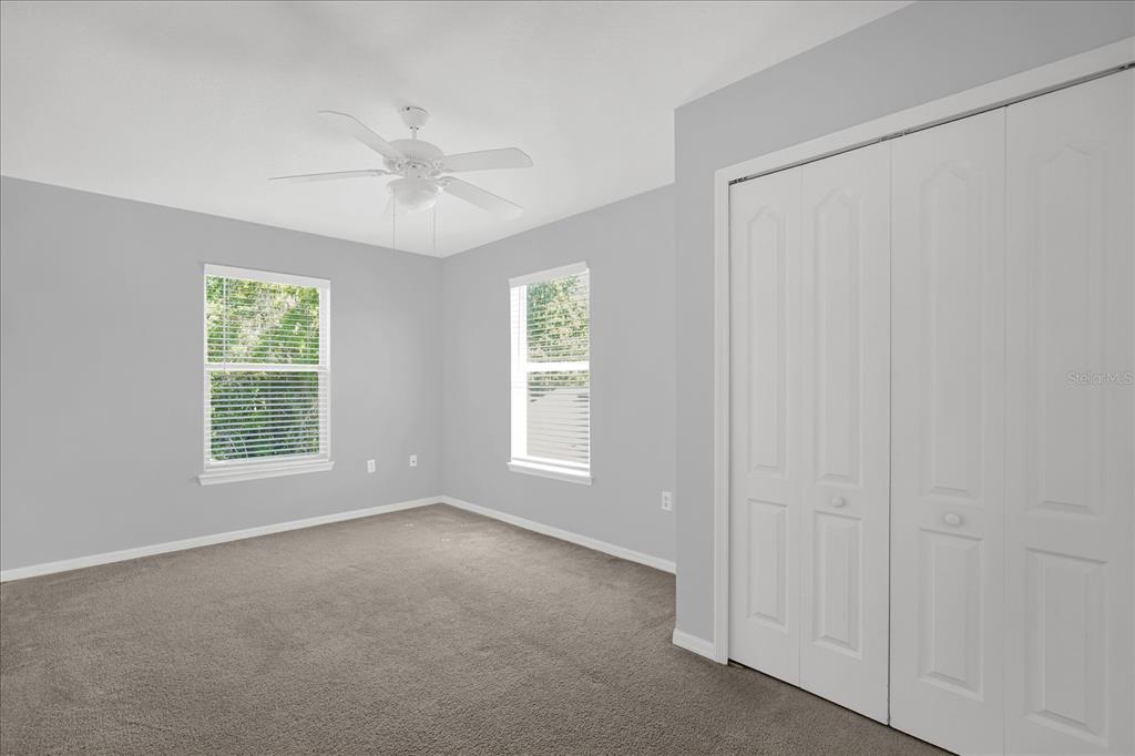 1453 Royal Ridge Drive Davenport, FL 33896 - Photo 20 of 32 a view of room with window and ceiling fan