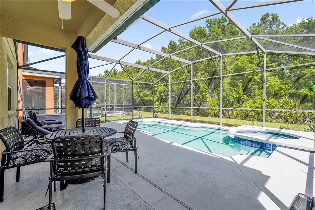 1453 Royal Ridge Drive Davenport, FL 33896 - Photo 25 of 32 a view of a chairs and table in the patio