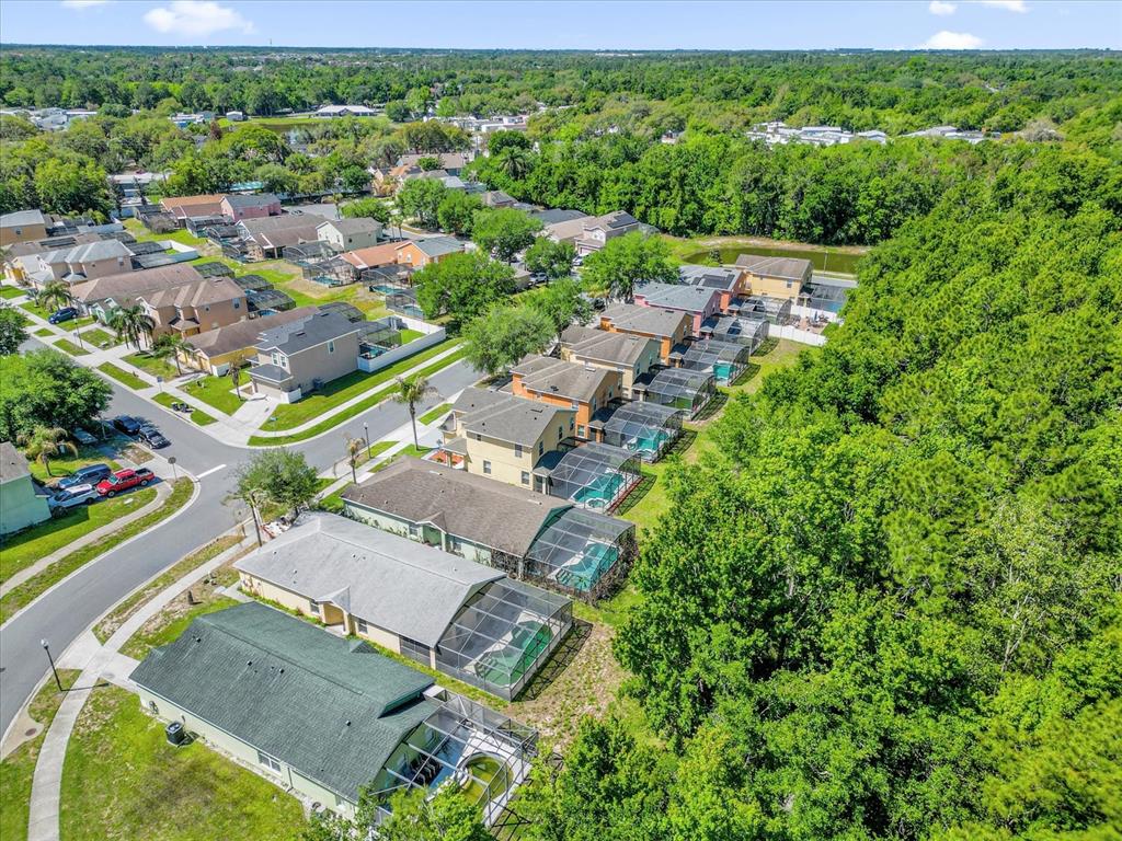 1453 Royal Ridge Drive Davenport, FL 33896 - Photo 31 of 32 an aerial view of residential houses with outdoor space and street view