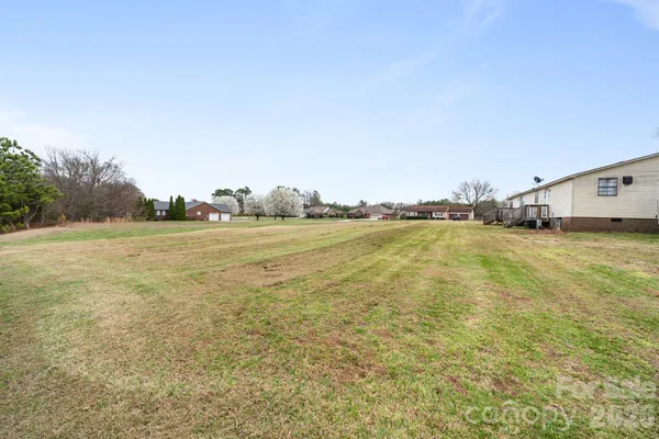 a house view with a outdoor space