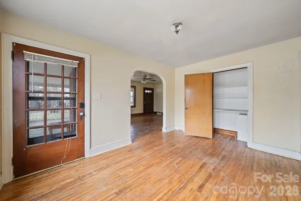 a kitchen with a refrigerator a sink and cabinets