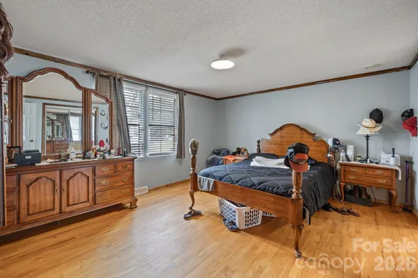 a bathroom with a tub sink and a mirror