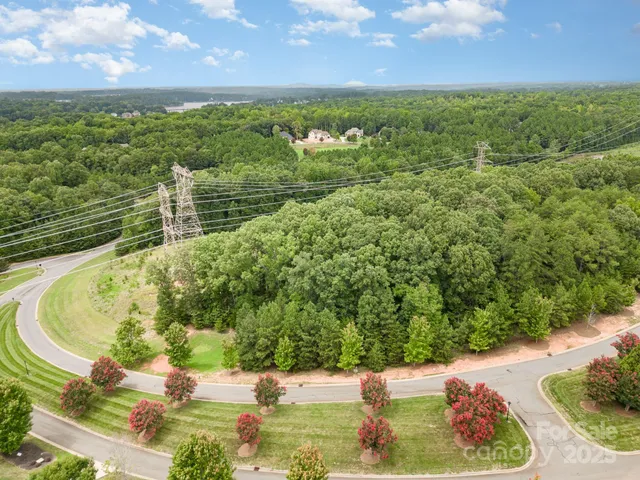 a view of a lake with a yard