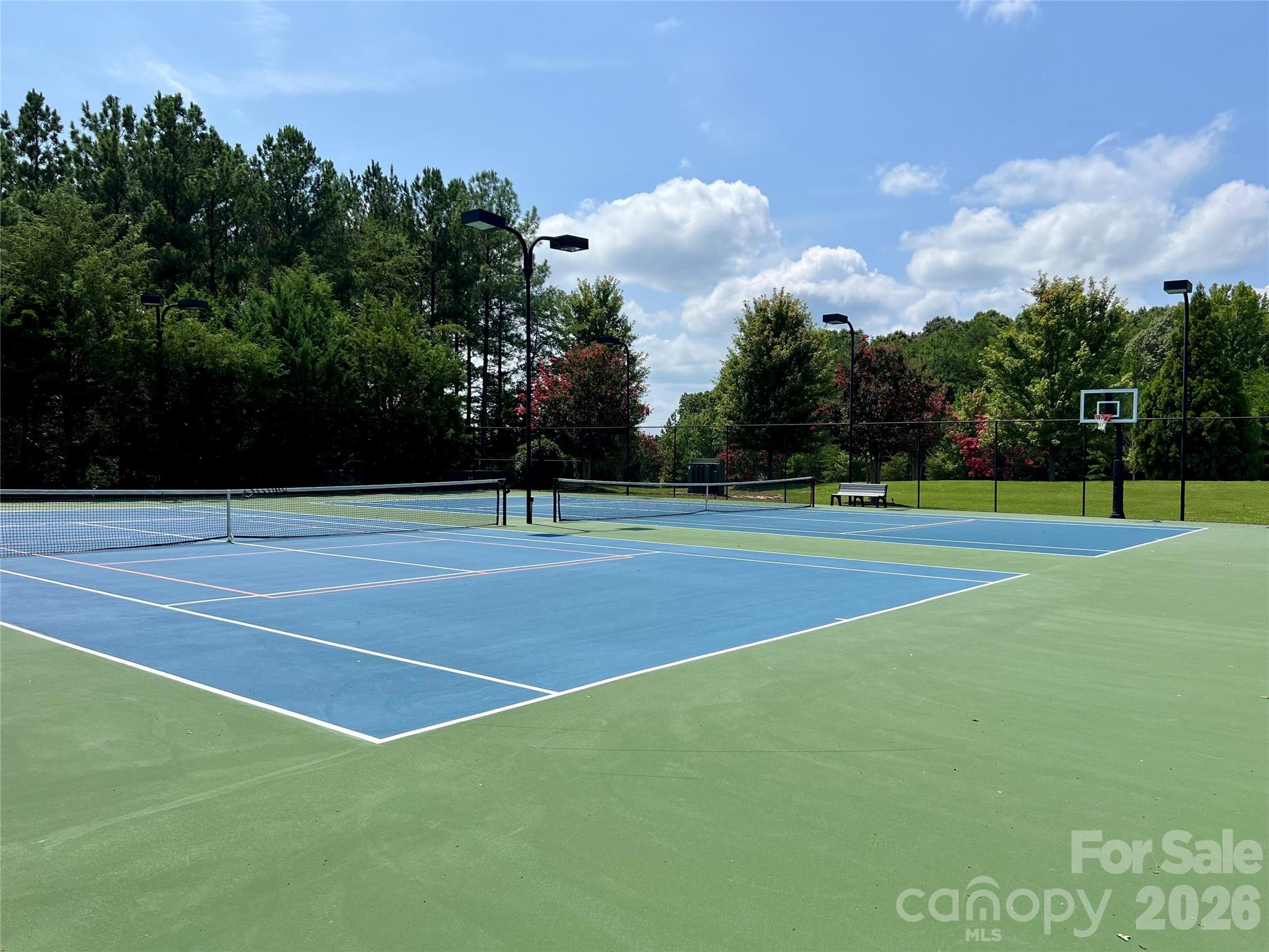 1400 Reflection Pointe Boulevard, Unit 327 Belmont, NC 28012 - Photo 12 of 19 a view of a tennis court