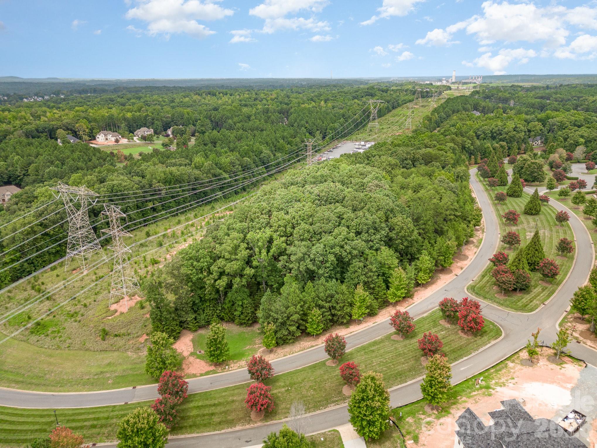 1400 Reflection Pointe Boulevard, Unit 327 Belmont, NC 28012 - Photo 14 of 19 a view of a yard with an outdoor seating