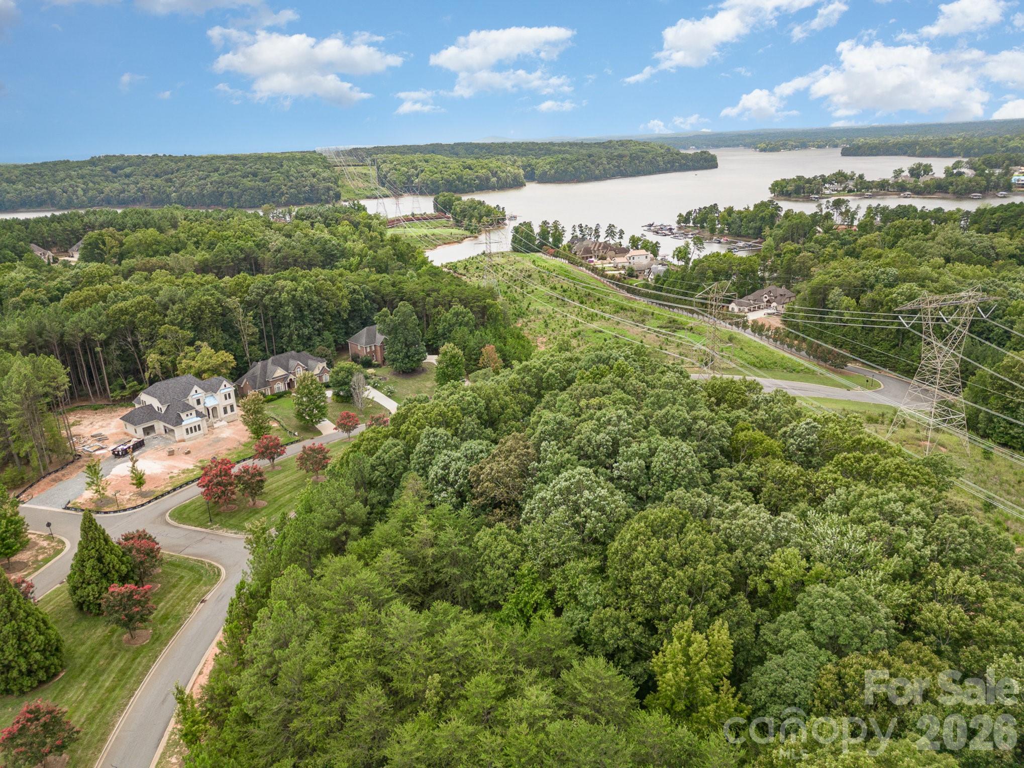 1400 Reflection Pointe Boulevard, Unit 327 Belmont, NC 28012 - Photo 15 of 19 a view of an ocean and a yard