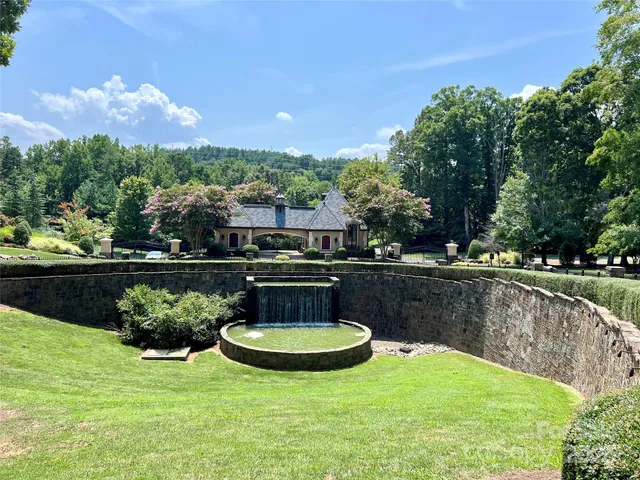 a view of a lake with a yard