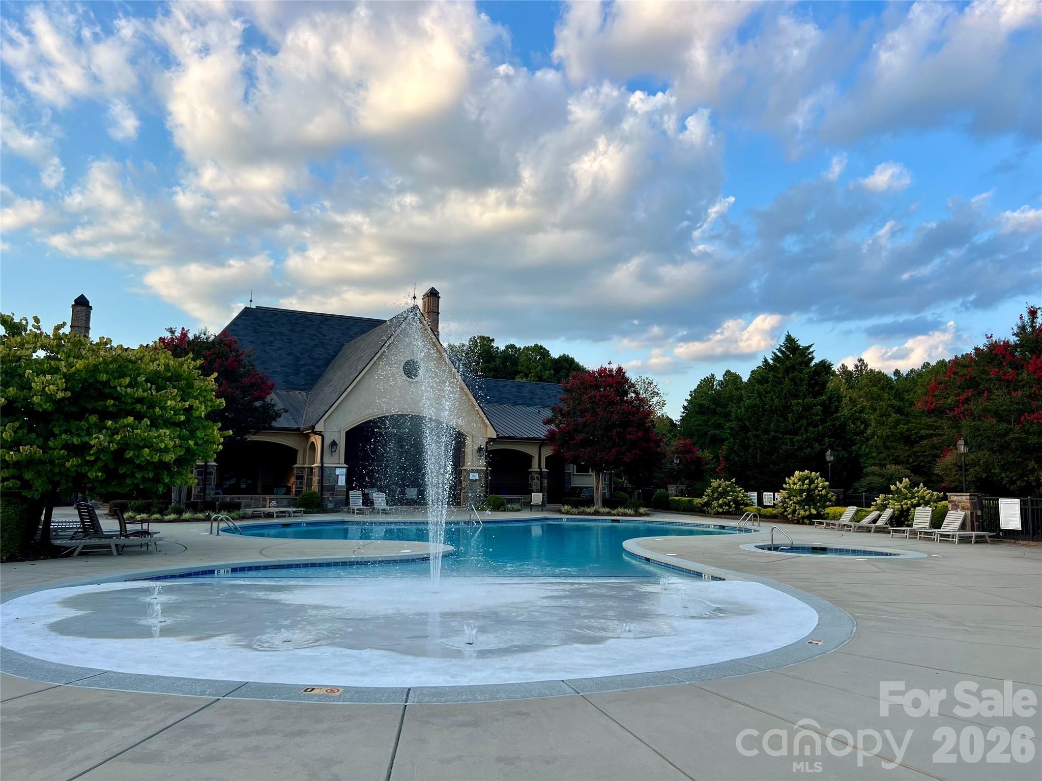 1400 Reflection Pointe Boulevard, Unit 327 Belmont, NC 28012 - Photo 4 of 19 a front view of a house with a yard
