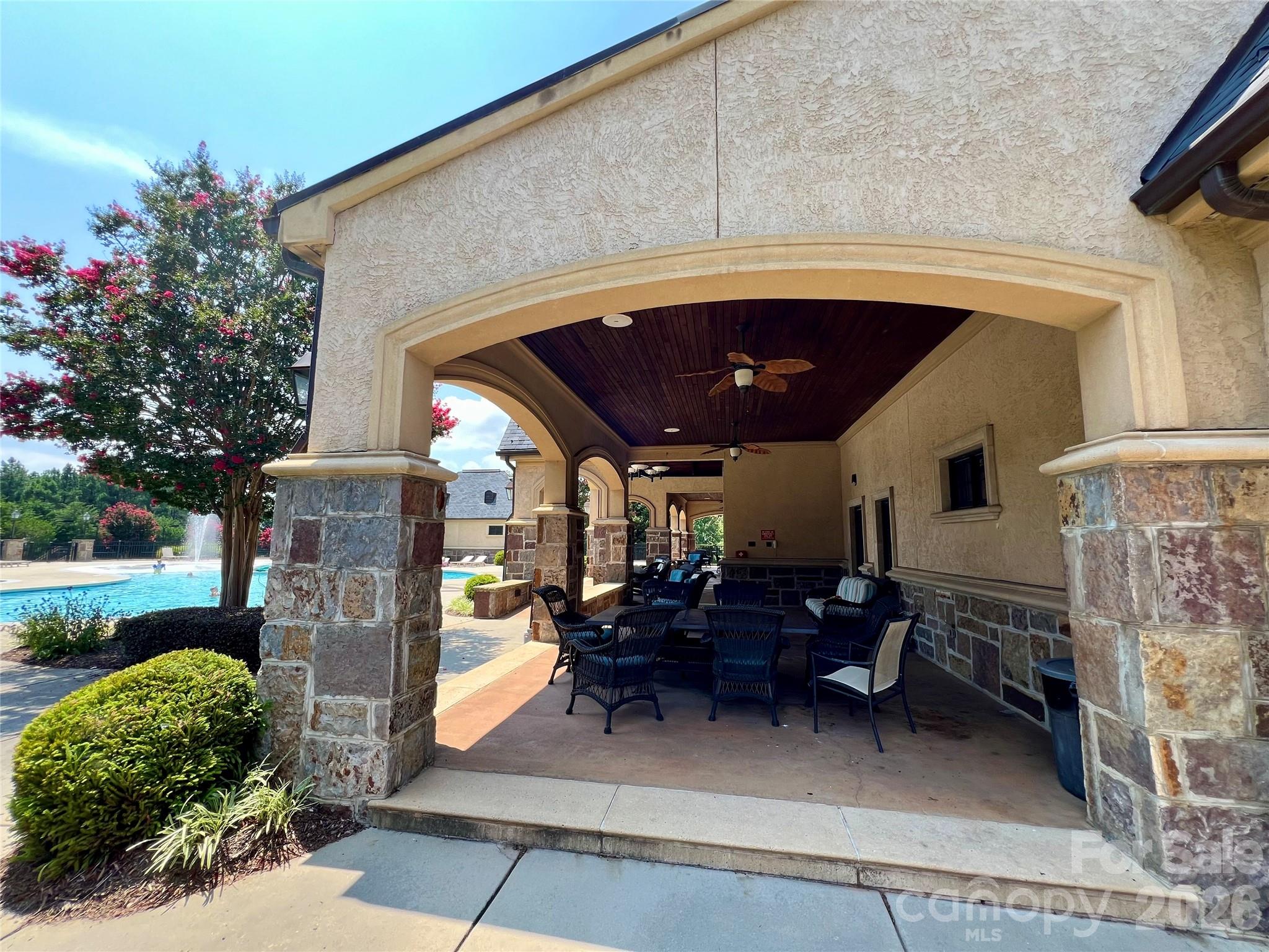 1400 Reflection Pointe Boulevard, Unit 327 Belmont, NC 28012 - Photo 7 of 19 a view of a porch with furniture