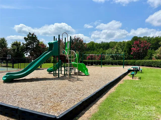 a park view with a bench