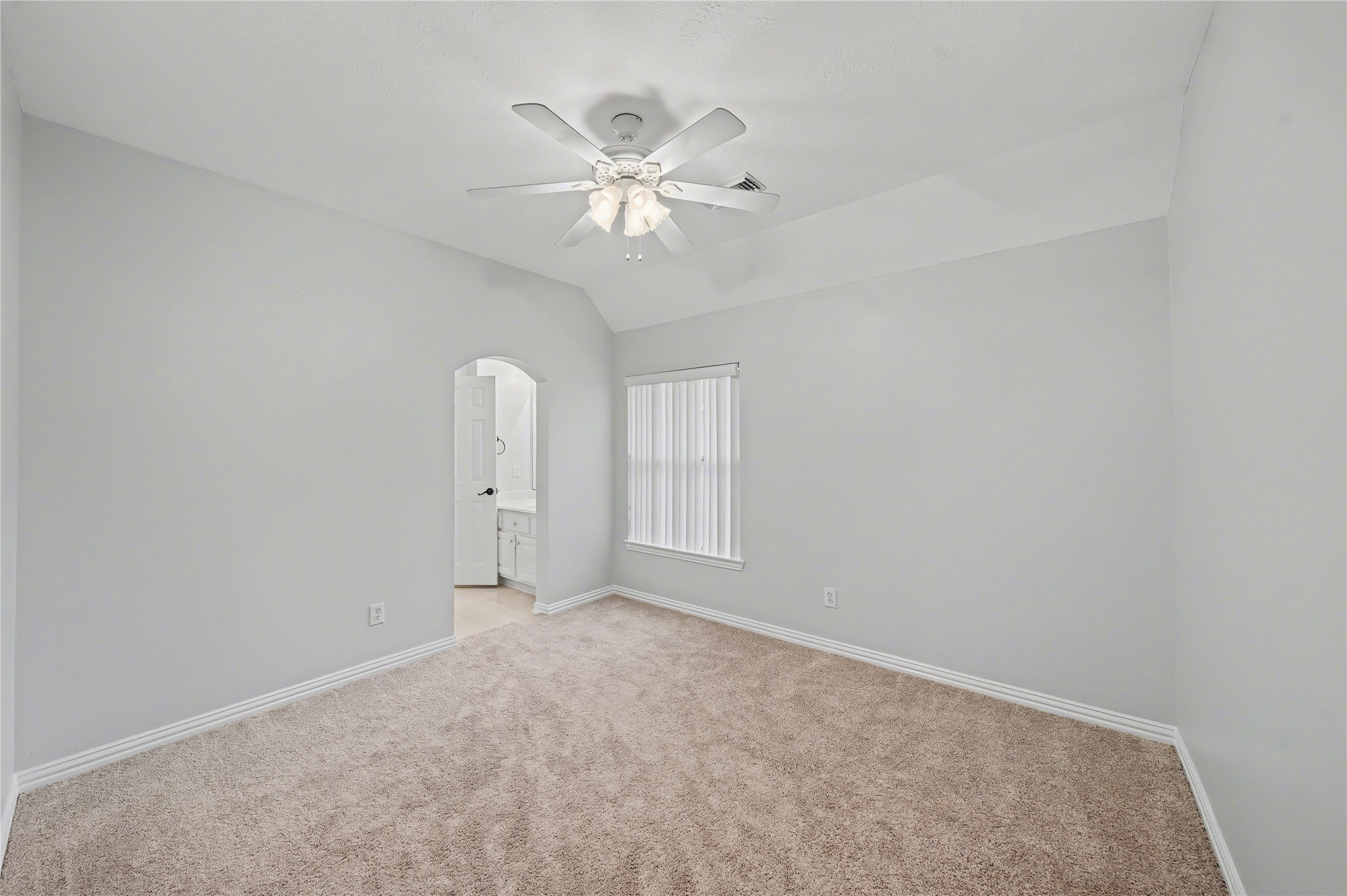 5403 Emerald Pointe Lane Sugar Land, TX 77479 - Photo 43 of 50 an empty room with chandelier fan and windows