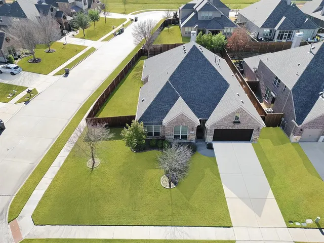 a view of an swimming pool with a yard