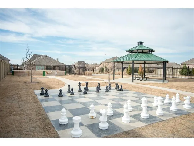 a view of a park with swings