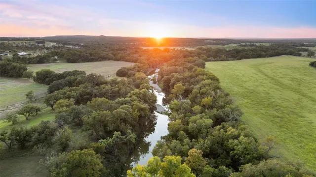 a kitchen with cabinets and stainless steel appliances