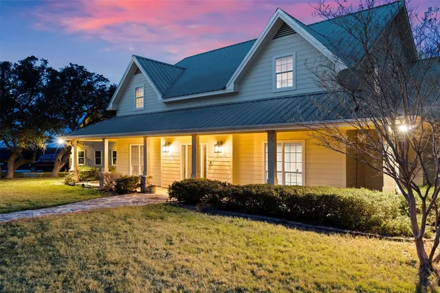 a view of a balcony with chairs