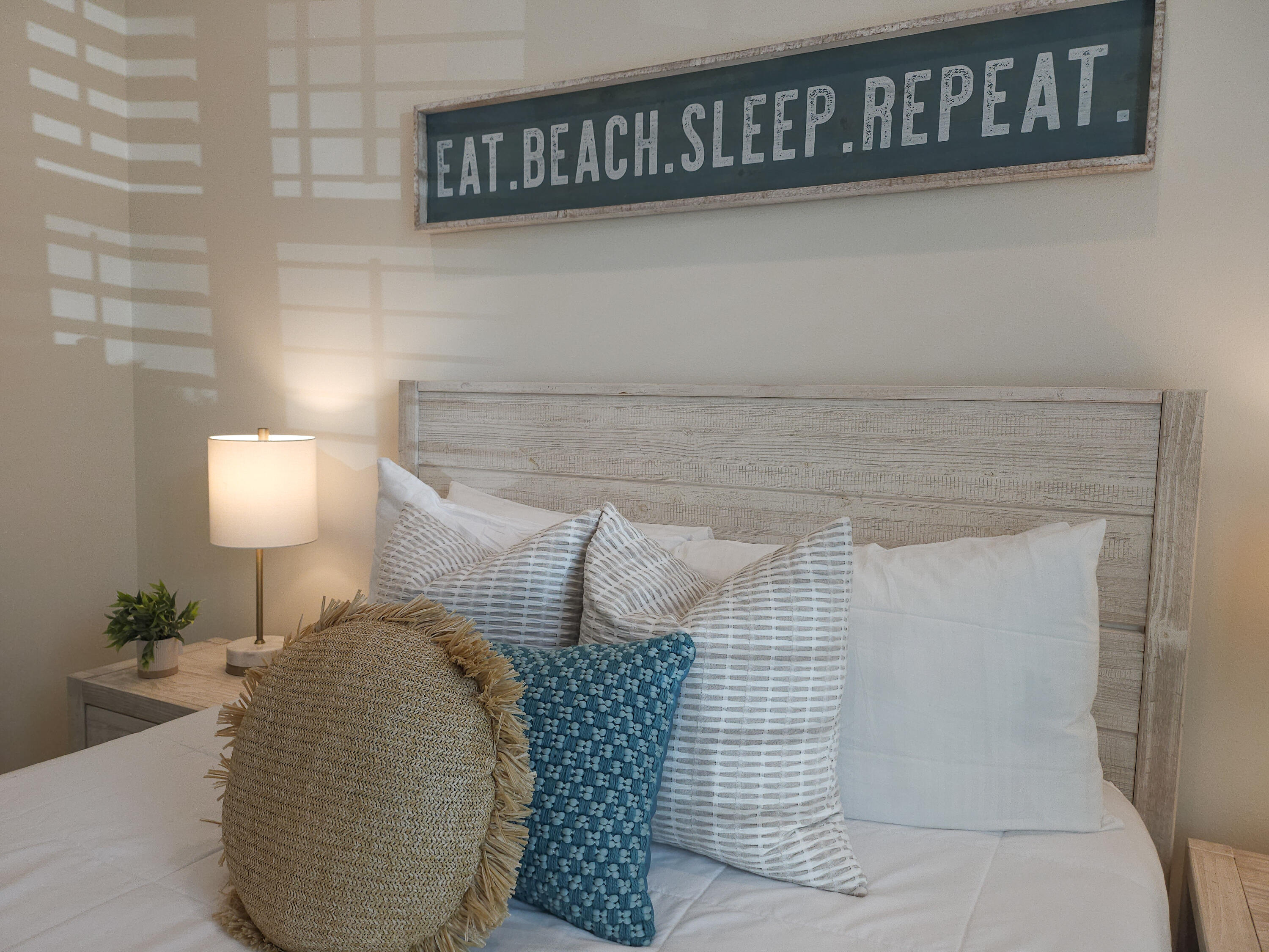 10 Gulfview Way Santa Rosa Beach, FL 32459 - Photo 24 of 40 a bedroom with a bed and a lamp