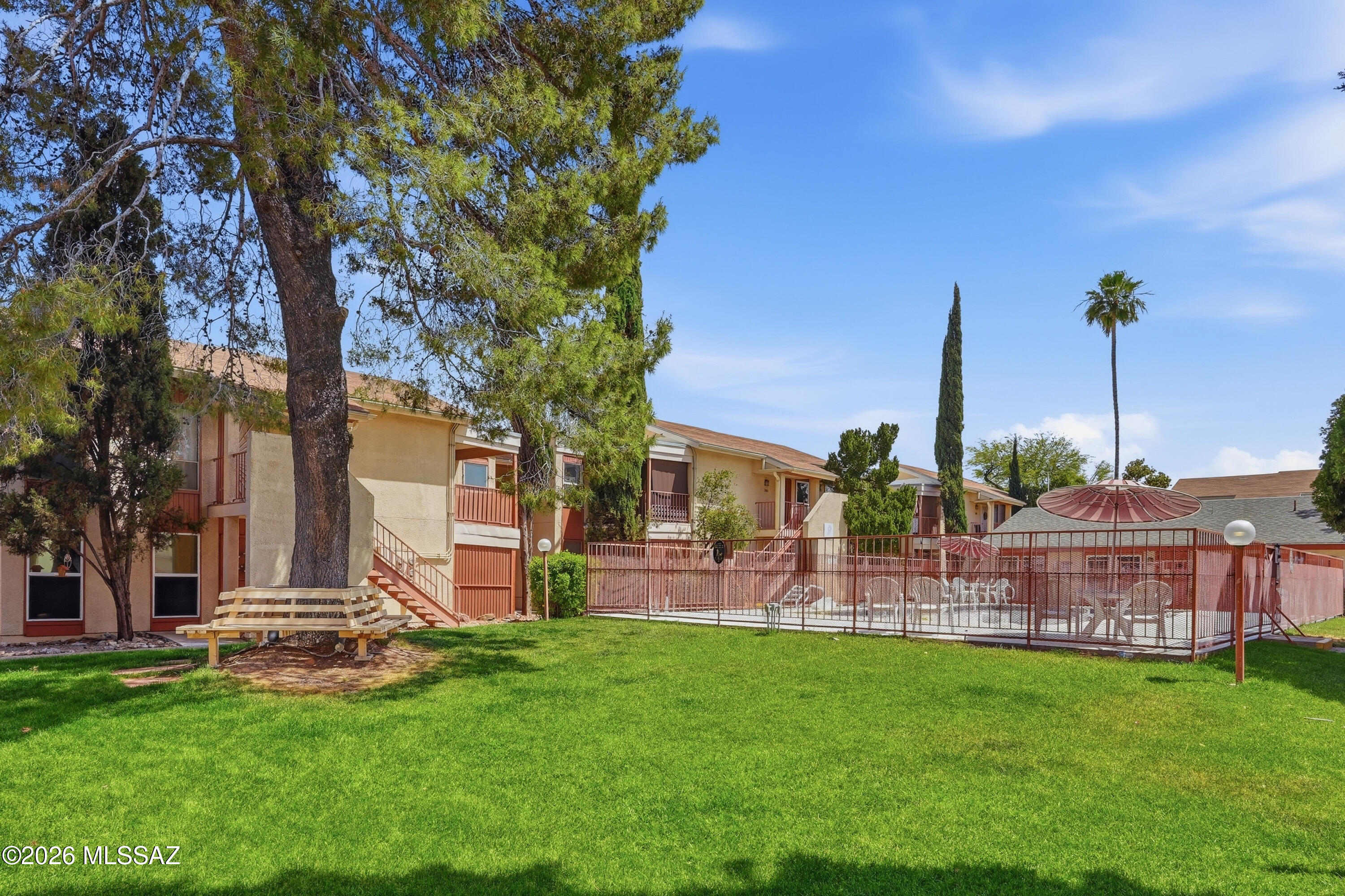 1600 North Wilmot Road, Unit 202 Tucson, AZ 85712 - Photo 22 of 26 Courtyard and Distant view of Pool #1