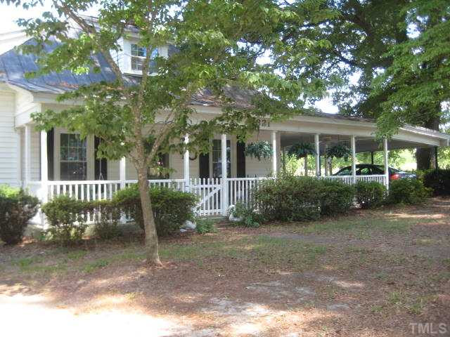 Rock away on the covered front porch, country style Exterior Front
