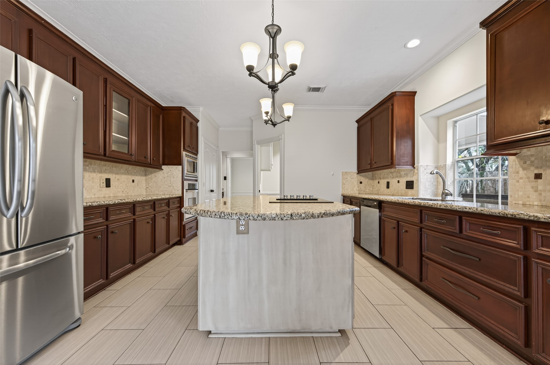 2115 Foreland Drive Houston, TX 77077 - Photo 16 of 50 Current kitchen with dark cabinets
