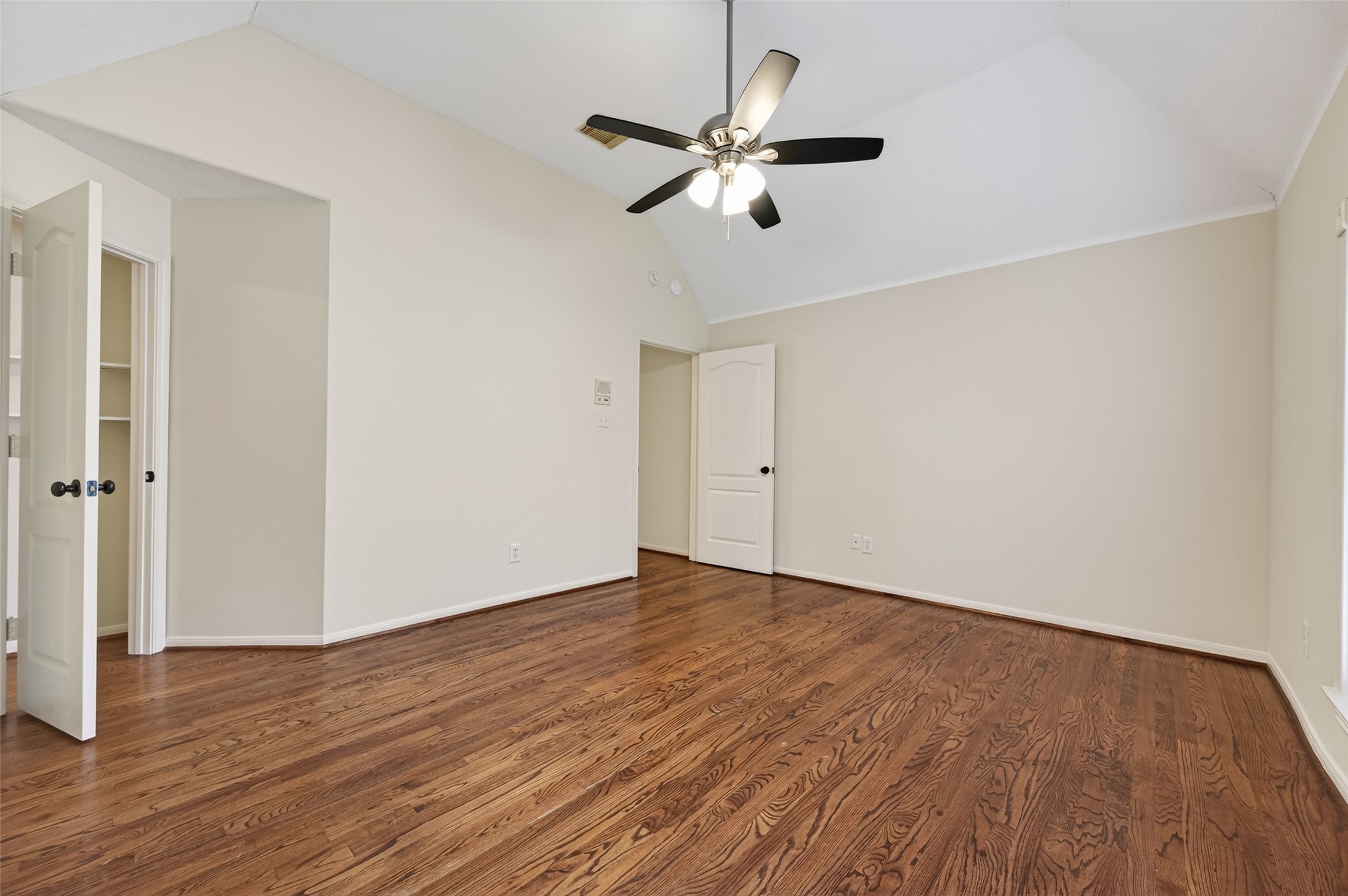 2115 Foreland Drive Houston, TX 77077 - Photo 41 of 50 3 of 3 bedrooms upstairs with walk in closet, wood flooring and ceiling fan