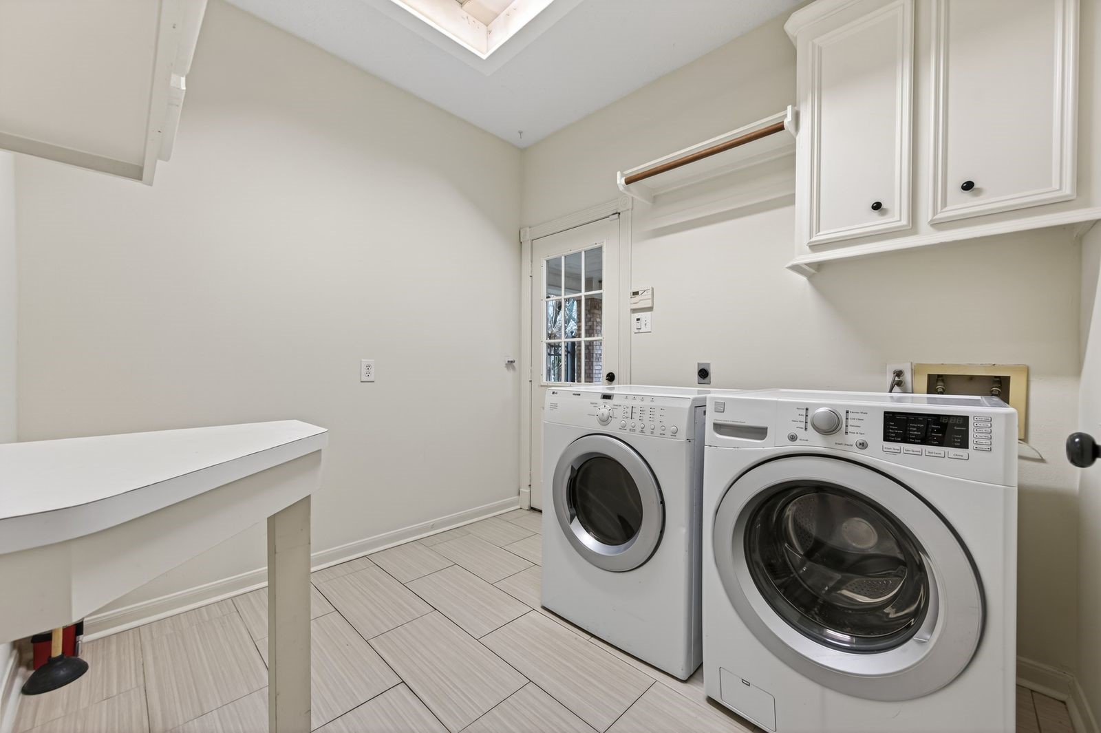 2115 Foreland Drive Houston, TX 77077 - Photo 49 of 50 Laundry room with access to outside