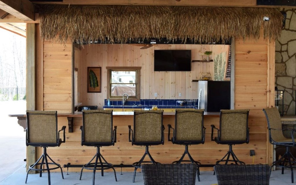 Lot 70 Ridge Peak View Blairsville, GA 30512 - Photo 8 of 12 a kitchen with stainless steel appliances kitchen island granite countertop a refrigerator and microwave