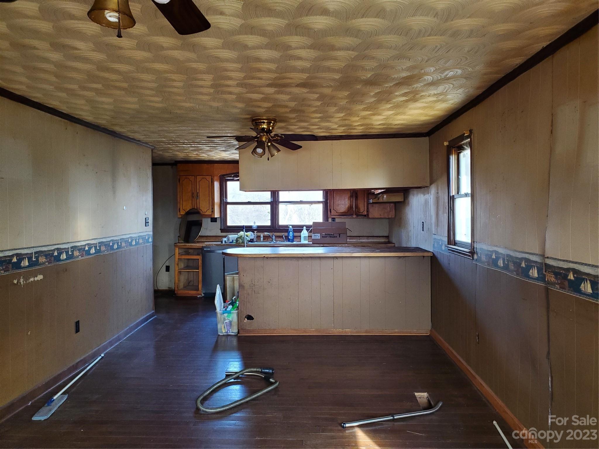 4260 Potneck Road Woodleaf, NC 27054 - Photo 3 of 11 a view of kitchen with furniture and wooden floor
