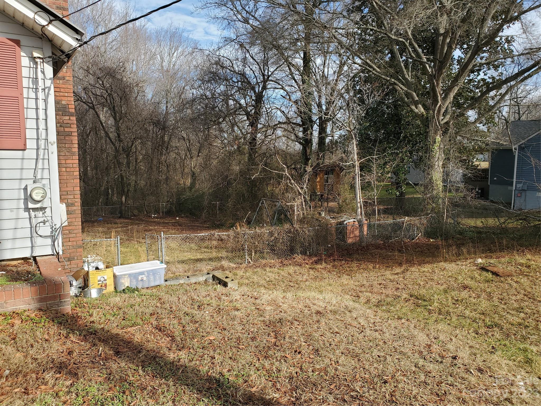 4260 Potneck Road Woodleaf, NC 27054 - Photo 9 of 11 a backyard of a house with lots of green space