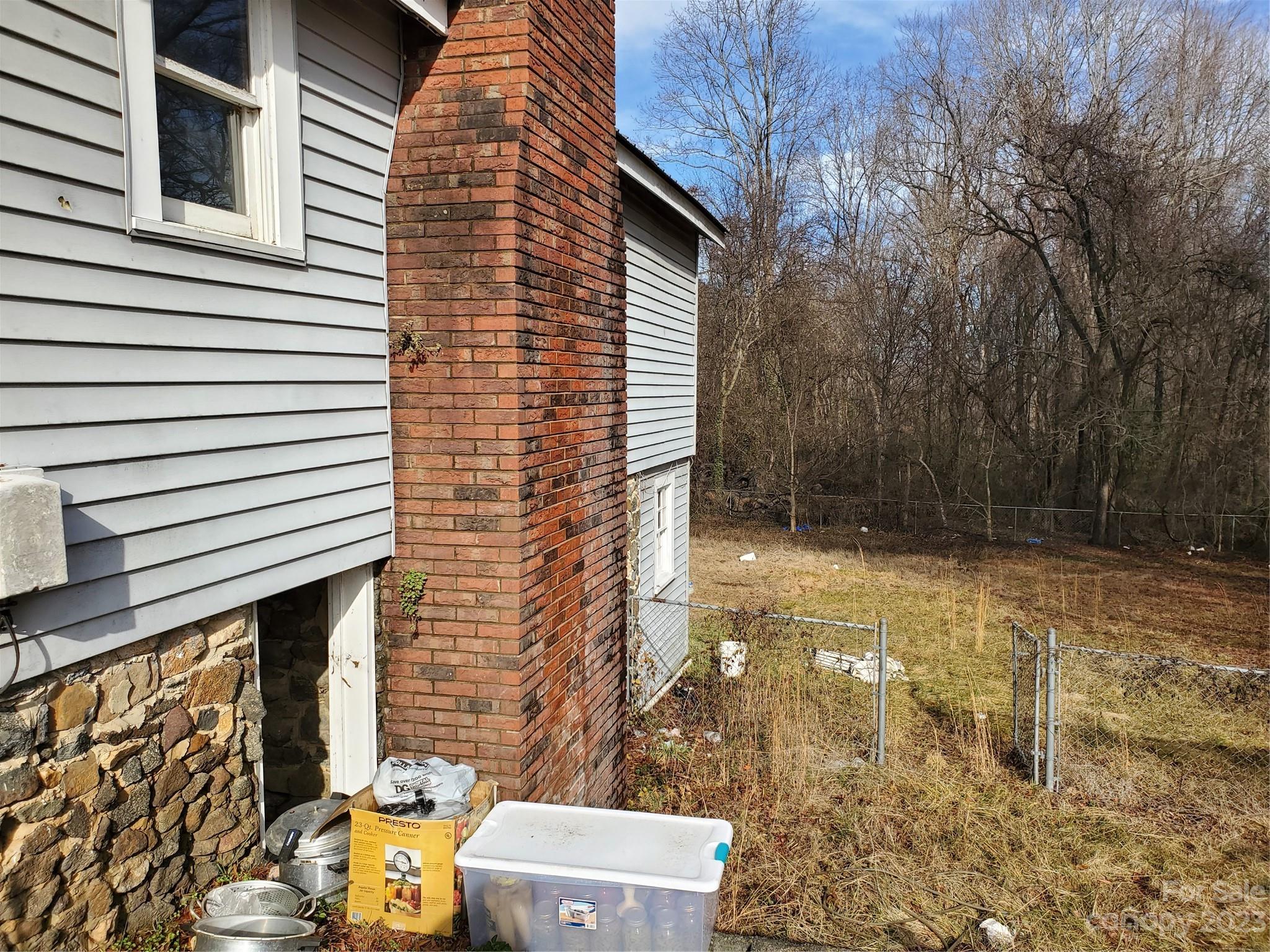 4260 Potneck Road Woodleaf, NC 27054 - Photo 10 of 11 a backyard of a house