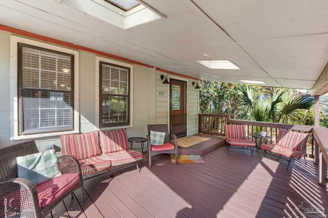 a outdoor living space with furniture and garden view