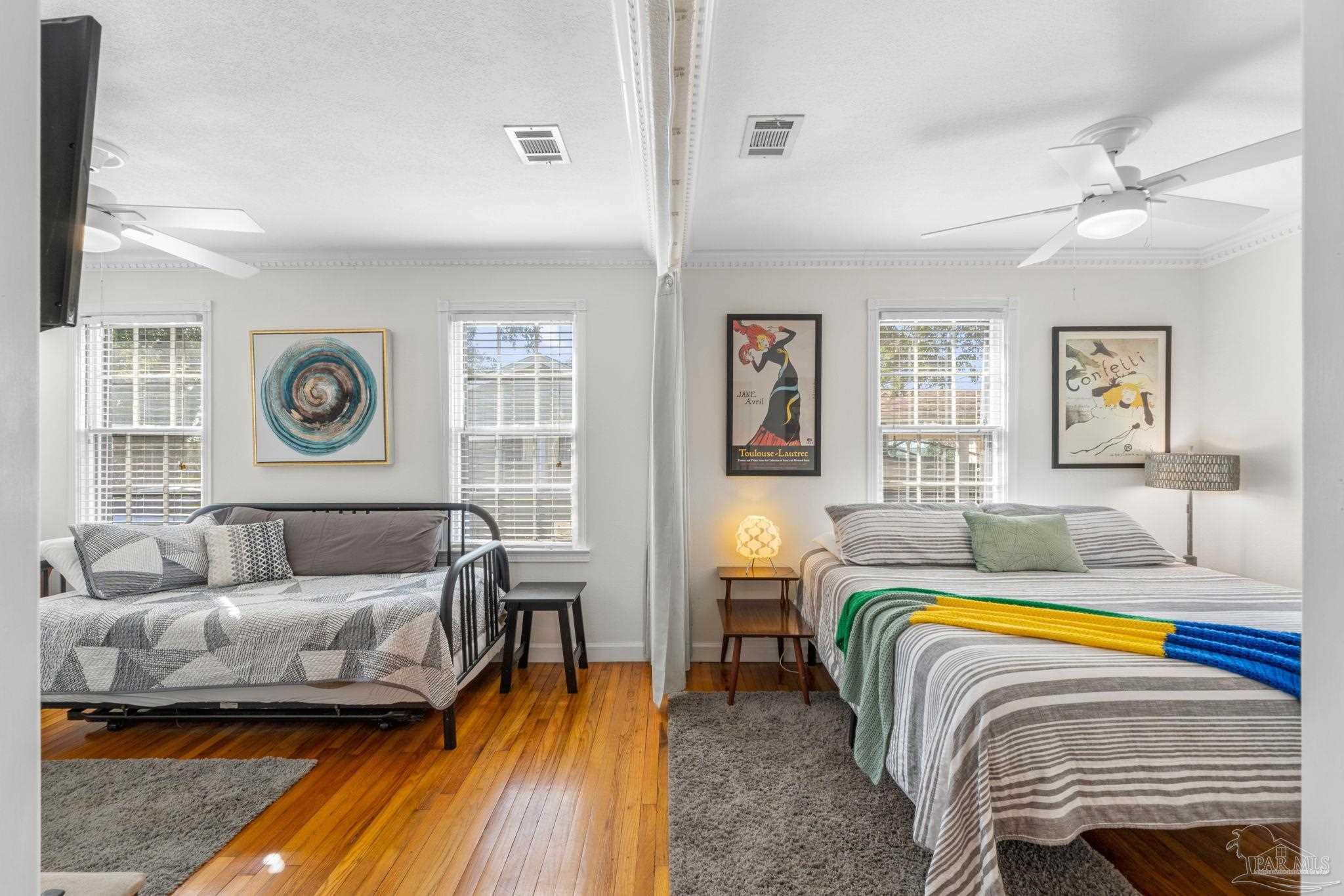 112 Cousineau Road Pensacola, FL 32507 - Photo 21 of 54 a living room with a bed furniture and a window