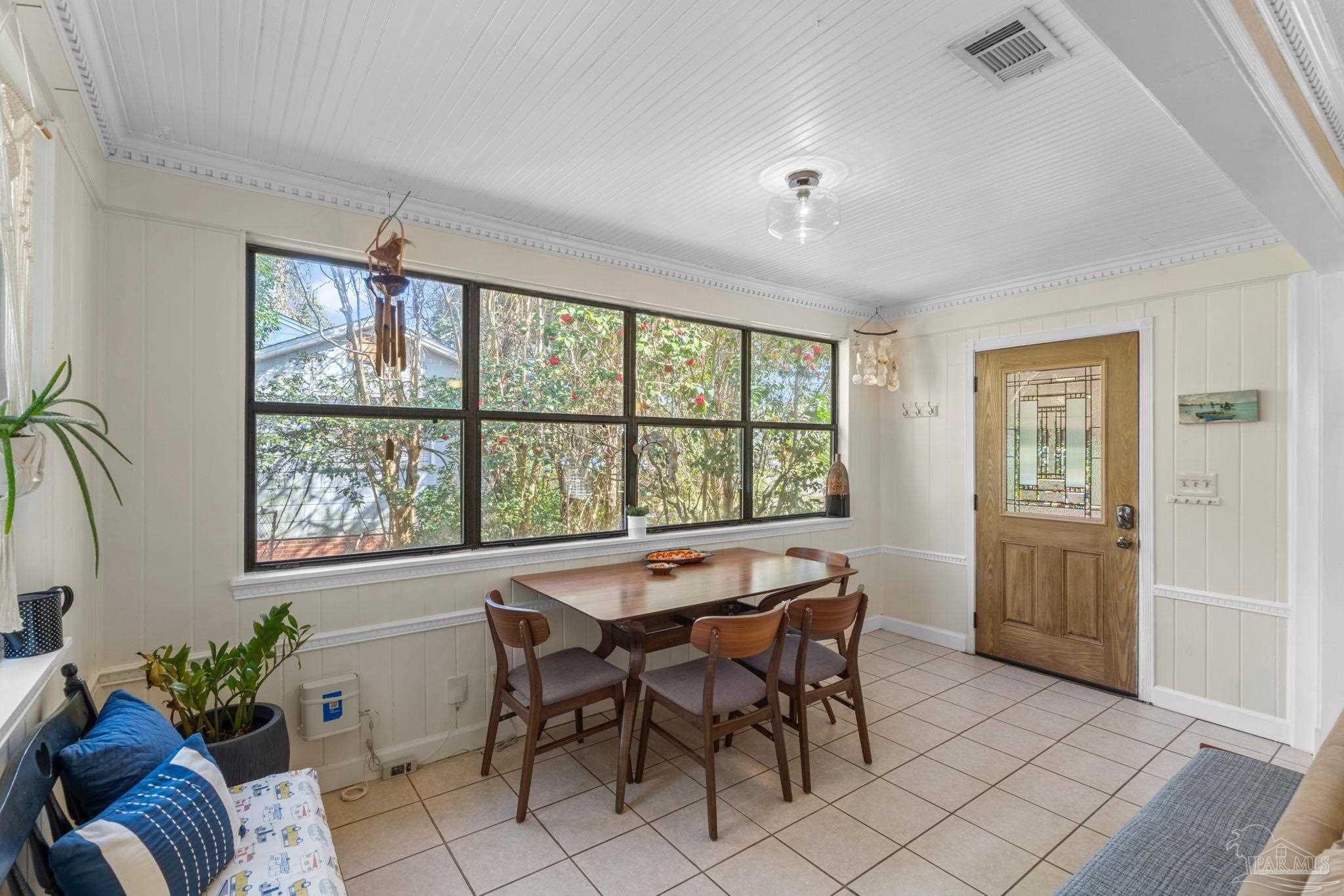 112 Cousineau Road Pensacola, FL 32507 - Photo 3 of 54 a view of a dining room with furniture window and outside view