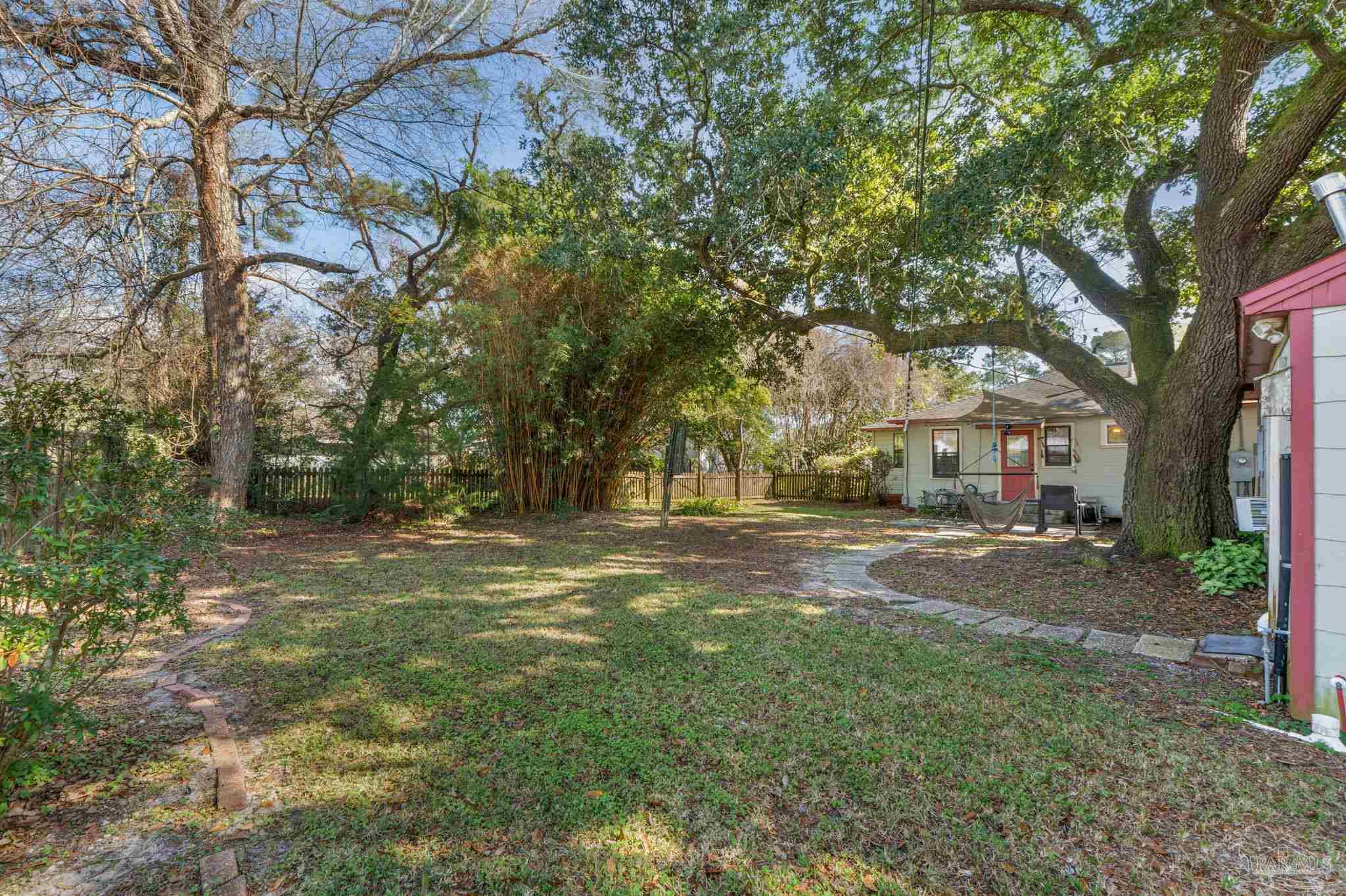 112 Cousineau Road Pensacola, FL 32507 - Photo 32 of 54 a view of road with trees