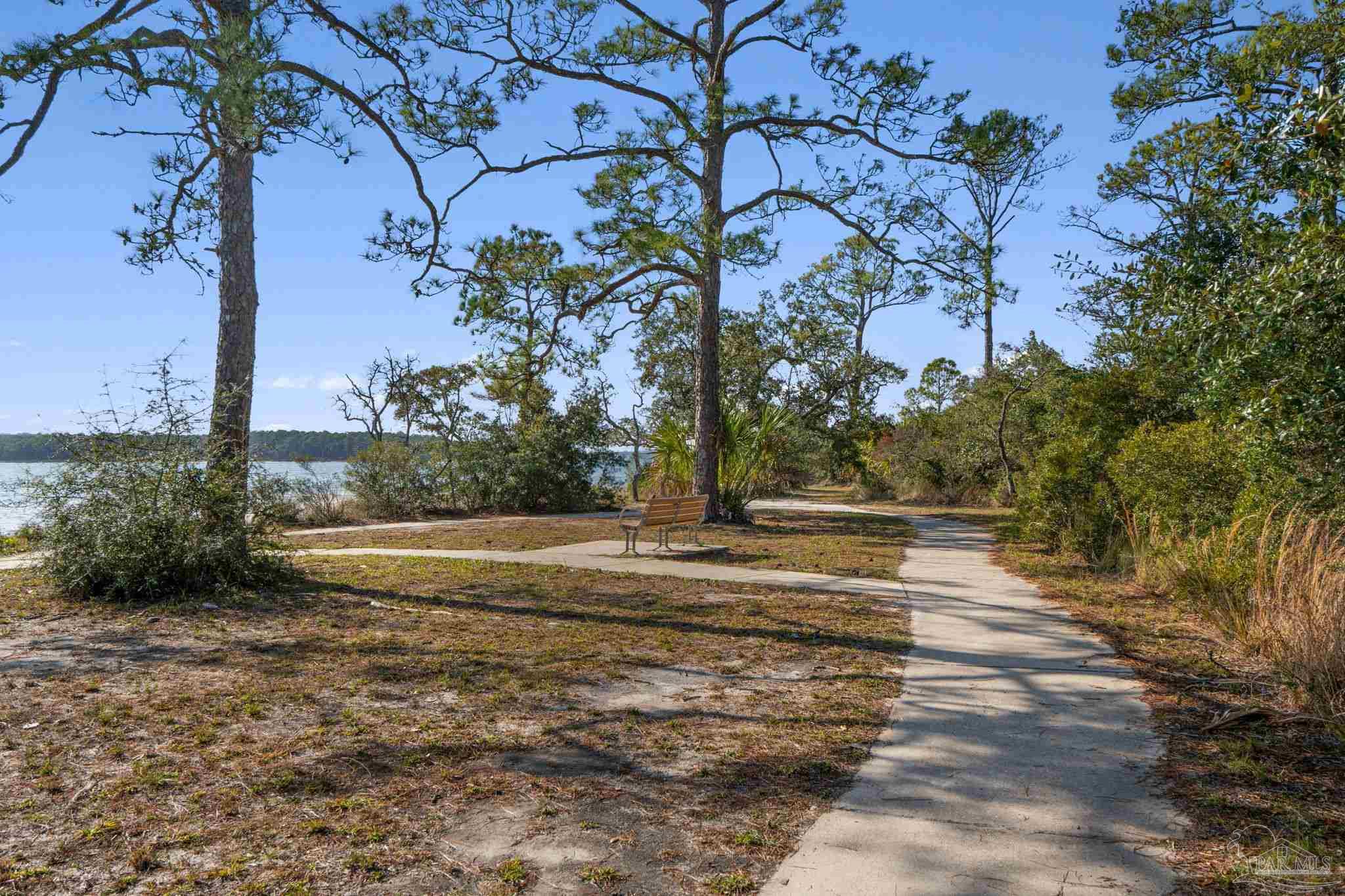 112 Cousineau Road Pensacola, FL 32507 - Photo 50 of 54 a view of a yard with plants and trees