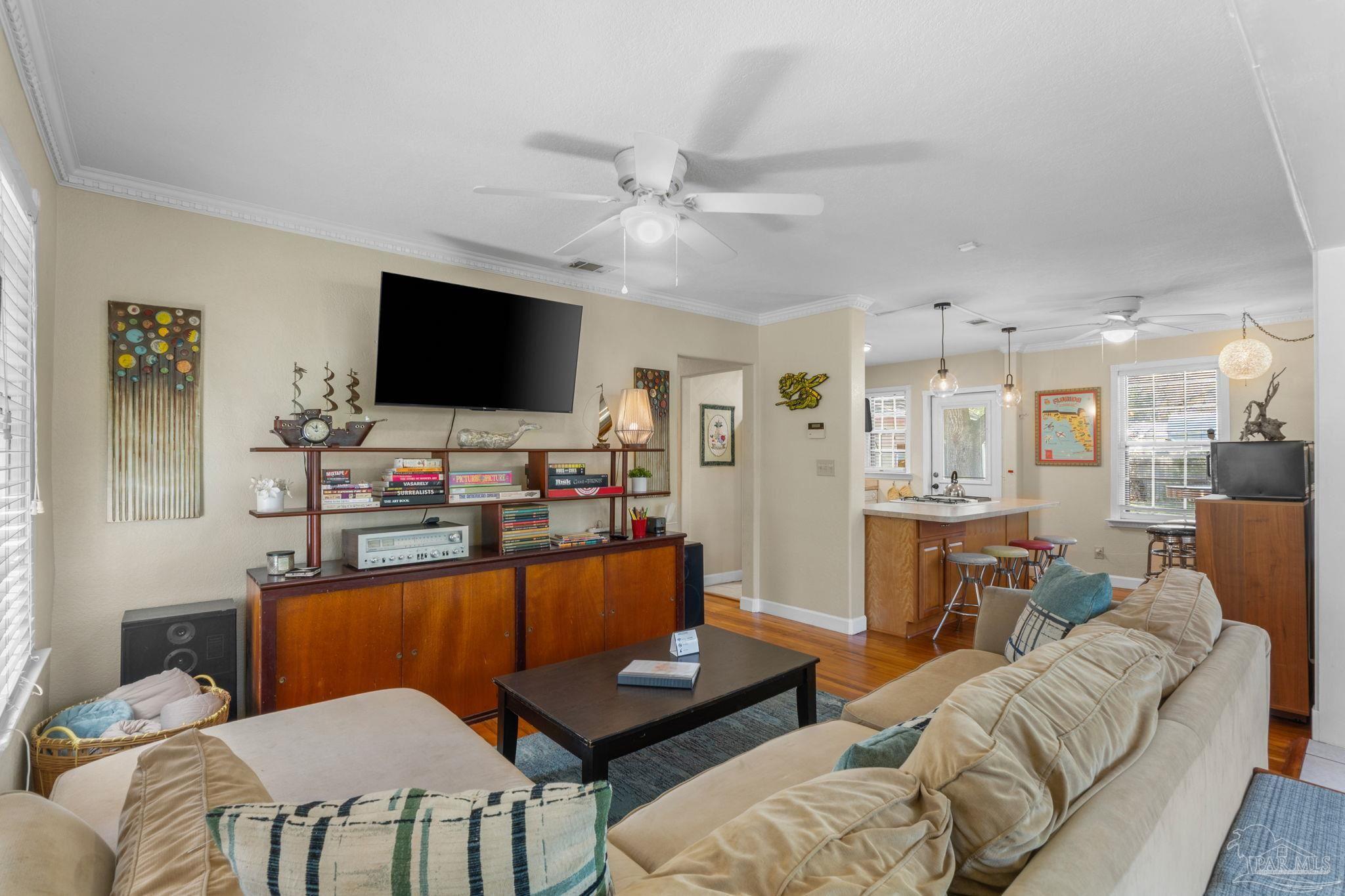 112 Cousineau Road Pensacola, FL 32507 - Photo 7 of 54 a living room with furniture and a flat screen tv