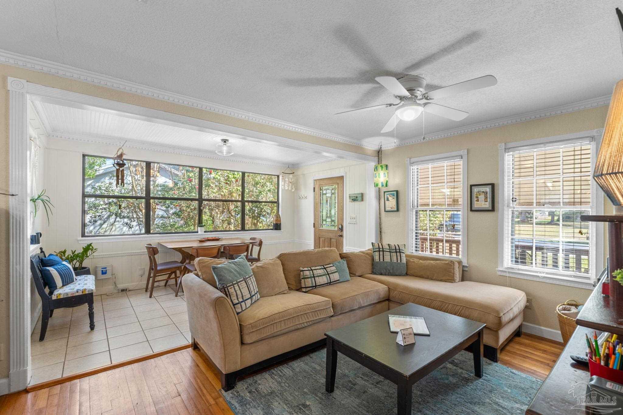 112 Cousineau Road Pensacola, FL 32507 - Photo 9 of 54 a living room with furniture and a large window