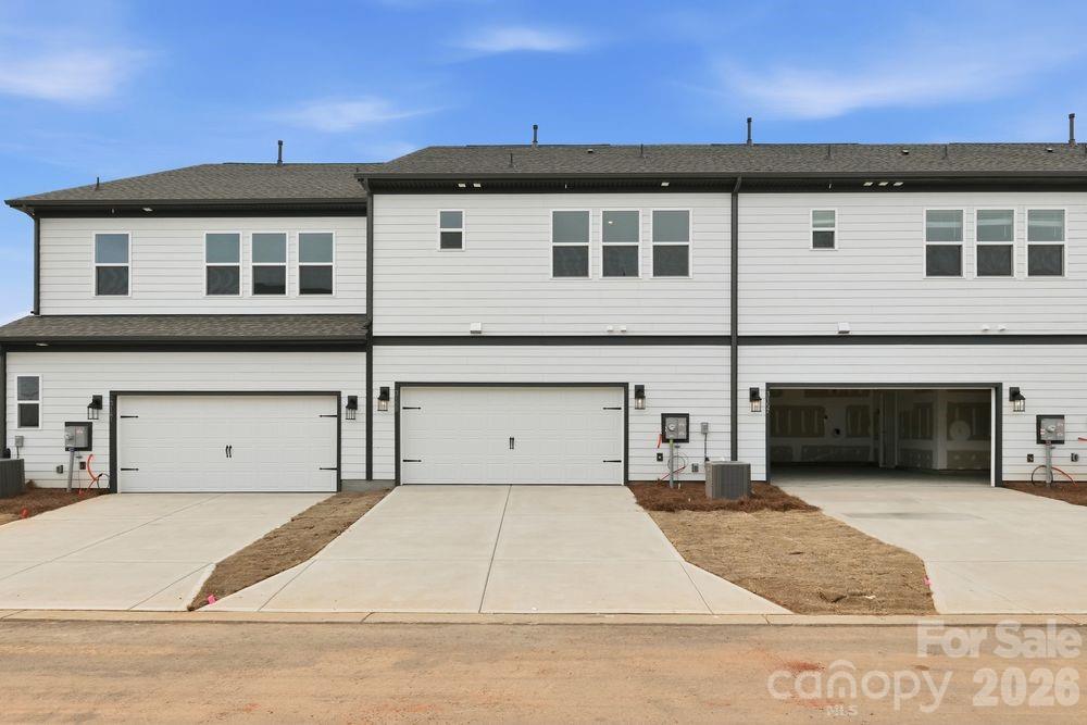 3159 Beacon Hts Road Indian Land, SC 29707 - Photo 15 of 33 a view of a building with a garage