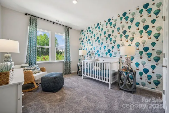 a bathroom with a double vanity sink a vanity and a mirror