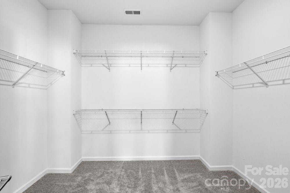 3159 Beacon Hts Road Indian Land, SC 29707 - Photo 7 of 33 a view of a room with racks on the wall