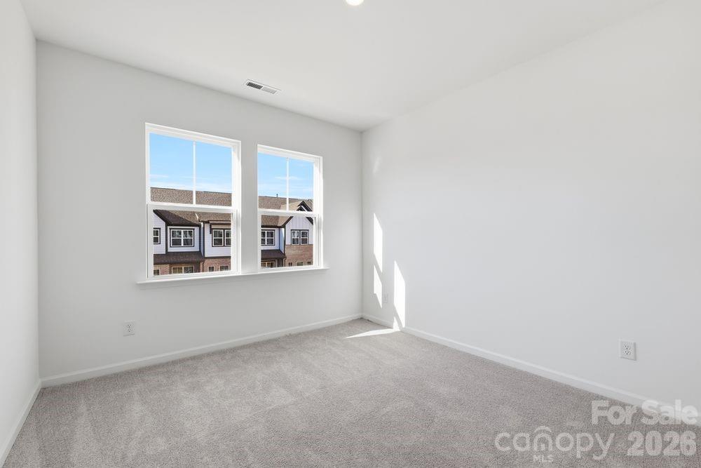 3159 Beacon Hts Road Indian Land, SC 29707 - Photo 8 of 33 a view of empty room with windows