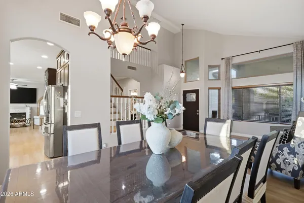 a kitchen with stainless steel appliances granite countertop a stove a microwave and cabinets