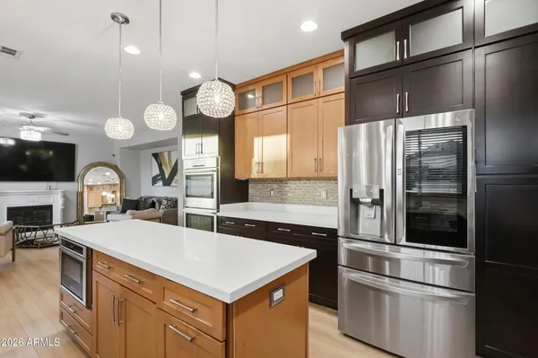 a bedroom with a bed and a potted plant