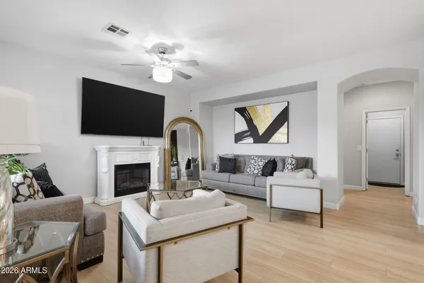 a view of an entryway with wooden floor