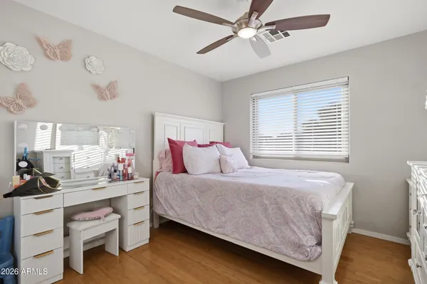 a bed room with a bed and a window